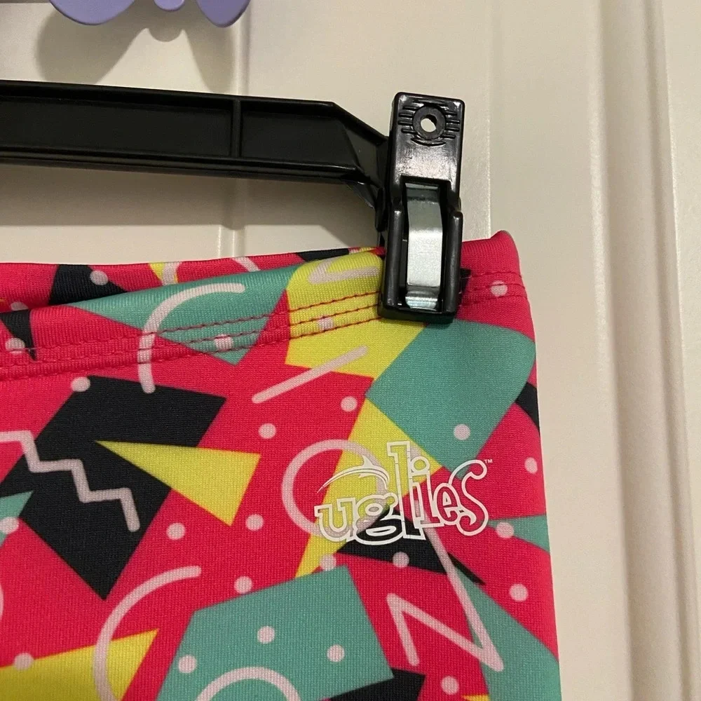 EUC | Dolfin girl’s Uglies patterned drag swim pants —‎ large